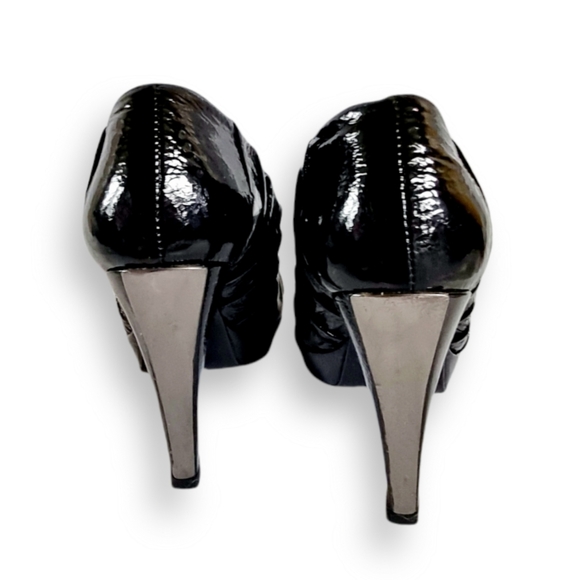Aldo, shiny, black heels with square, pyramid-shaped, silver button US 7 EUR 38 - Picture 2 of 4